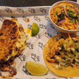 The Cuban taco(left), the cold peanut noodles, and the Tinga taco (bottom right) The Cuban taco(left), the cold peanut noodles, and the Tinga taco (bottom right)