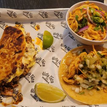Dirty Taco + Tequila Bayside - The Cuban taco(left), the cold peanut noodles, and the Tinga taco (bottom right) - Tacos Near Me - Bayside, New York Dirty Taco + Tequila Bayside - The Cuban taco(left), the cold peanut noodles, and the Tinga taco (bottom right) - Tacos Near Me - Bayside, New York