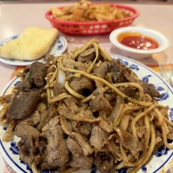 Emperor Mongolian BBQ - Beef, chicken, pork with noodles, onions, & cilantro