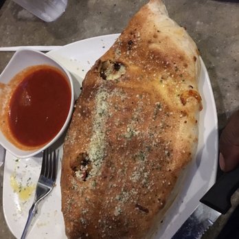 The Brick House Tap & Grill - Calzone was great and toppings didn't break the bank - Bars Near Me - Irwin, Pennsylvania The Brick House Tap & Grill - Calzone was great and toppings didn't break the bank - Bars Near Me - Irwin, Pennsylvania