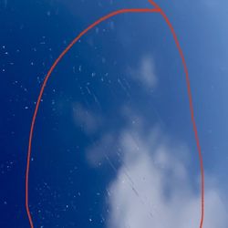Take 5 Car Wash - Scratches in a swirl pattern on the roof.