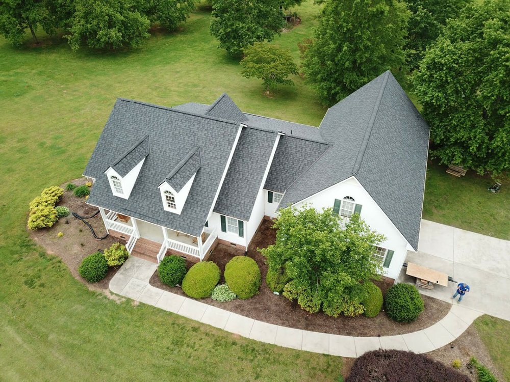 Slide of Freeman Roofing