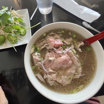 Kien Giang - Pho dac biet- rare steak, tripe, and well done steak (requested without the meatballs) - broth is AMAZING and thickened by the fat - Vietnamese Near Me - D'Iberville, Mississippi Kien Giang - Pho dac biet- rare steak, tripe, and well done steak (requested without the meatballs) - broth is AMAZING and thickened by the fat - Vietnamese Near Me - D'Iberville, Mississippi