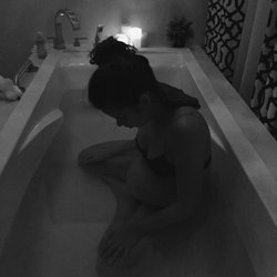 Paige Green - Laboring in the tub during transition.