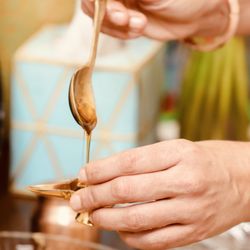 Ayutherapy - Ayurveda Wellness Center - Warm, herb infused oil preparation at at Ayutherapy Ayurveda Wellness Center