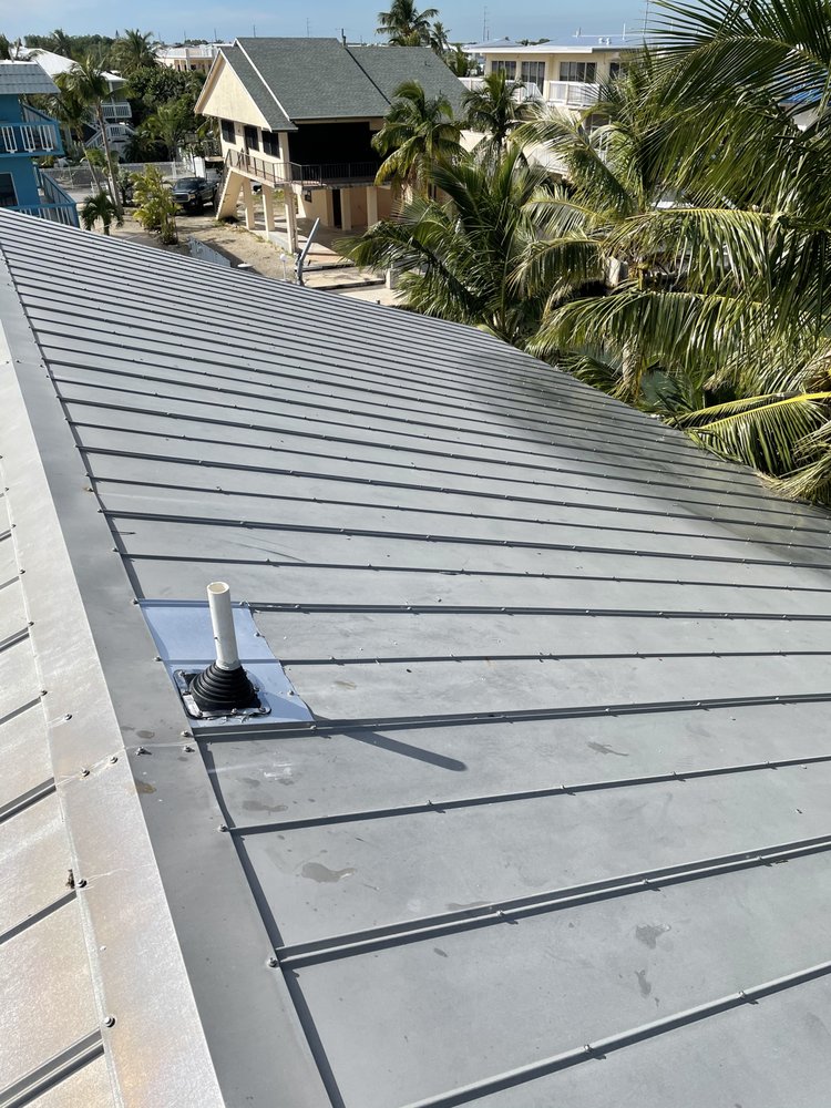 Slide of Andy The Roofer & Co