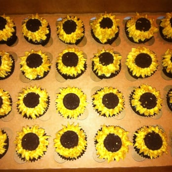 Cupcakes by Jo - a box of sunflower cupcakes - Bakeries Near Me