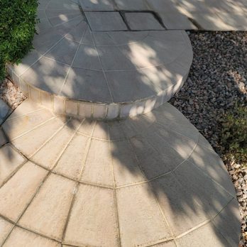 NSR Services - a stone walkway in a garden - Flooring Near Me NSR Services - a stone walkway in a garden - Flooring Near Me