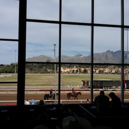 Watching horse racing at