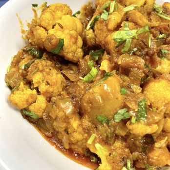 Indian Village - Gobi masala (also has potato, so like aloo gobi) - Vegetarian Near Me - Bakersfield, California Indian Village - Gobi masala (also has potato, so like aloo gobi) - Vegetarian Near Me - Bakersfield, California