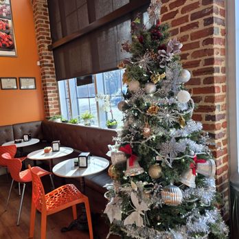 DOLCE & AMARO ARTISAN BAKERY - A view of the seating area of the bakery. - Bakeries Near Me - Greensboro, North Carolina DOLCE & AMARO ARTISAN BAKERY - A view of the seating area of the bakery. - Bakeries Near Me - Greensboro, North Carolina