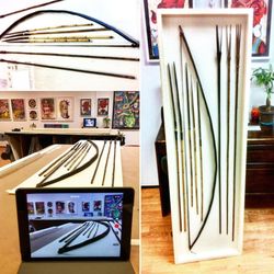 ABC Custom Framing - Rare Collectables. Head-hunter bow and arrows.