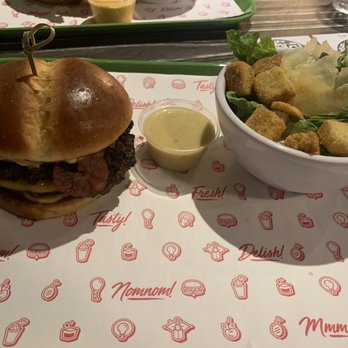 Baby's - The Strut Burger with side Caesar salad - American Near Me - Indianapolis, Indiana Baby's - The Strut Burger with side Caesar salad - American Near Me - Indianapolis, Indiana