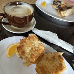 Latte, coconut key linen and blueberry muffin. Latte, coconut key linen and blueberry muffin.
