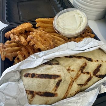 Painted Rooster - Crispy Chicken Tender Ceasar Wrap with waffle fries - Chicken Wings Near Me - Charlotte, North Carolina