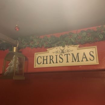 Vindicktive Wings - Christmas themed bathroom - Chicken Wings Near Me - Seattle, Washington Vindicktive Wings - Christmas themed bathroom - Chicken Wings Near Me - Seattle, Washington