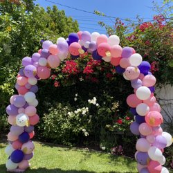 Bargain Balloons by Modesta - Organic arch with puppies balloons on it