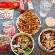Photo of Yelp Elite Week: DoorDash Kitchen RWC - Redwood City, CA, United States. The RTR salad with chicken and umami fries = bomb! Thanks Yelp Peninsula for the swag!! Doordash guy ran over and gave me 2 Milk Cookies!