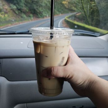 I Wana Moka - a hand holding a cup of iced coffee - Coffee & Tea Near Me - Bellingham, Washington I Wana Moka - a hand holding a cup of iced coffee - Coffee & Tea Near Me - Bellingham, Washington