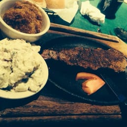 Blacken strip steak, potato salad and fried green tomatoes. Blacken strip steak, potato salad and fried green tomatoes.