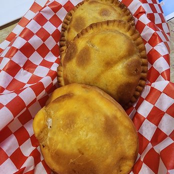 Arepa Venezuelan Kitchen - Bellevue - Pasteles! We got the beef and the cheese one. - Empanadas Near Me - Bellevue, Washington