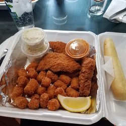 Loxstock & Barrel - Chicken fingers with potato barrels (tots) suicide sauce on side.
