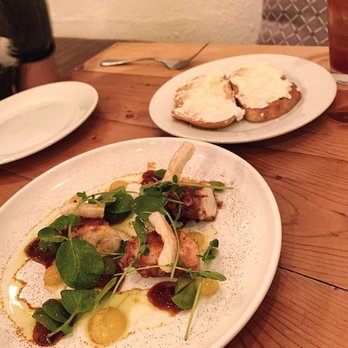 Nutwood - Grilled Octopus (front)  Ricotta Sourdough (back) - New American Near Me - Winter Haven, Florida