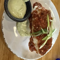 Burrito de Pollo with a side of avocado crema