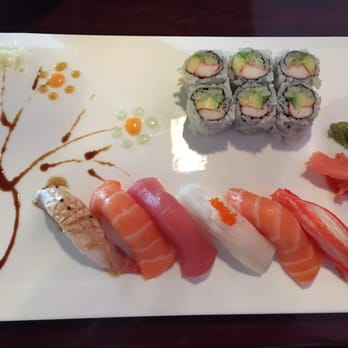 Asian Pop - My very delicious $10 lunch included soup and salad they even de orated the plate with edible art - Sushi Bars Near Me - Ocala, Florida