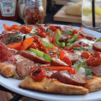 Fratellos Waterfront Restaurant - Cajun pizza with andouille sausage. Great crust. Very tasty. - Bars Near Me - Appleton, Wisconsin