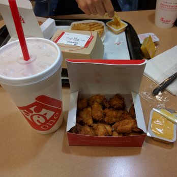 Chick-fil-A - My yummy meal - lemonade and 12 piece chicken nuggets with their famous Chick Fil A sauce - Fast Food Near Me - Seal Beach, California