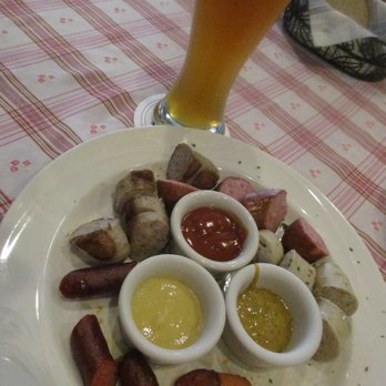 Schmankerl Stube - Wursts sampler, array of Sausages for two people, ($15) with a draft Bavarian beer ($6) - German Near Me - Hagerstown, Maryland Schmankerl Stube - Wursts sampler, array of Sausages for two people, ($15) with a draft Bavarian beer ($6) - German Near Me - Hagerstown, Maryland