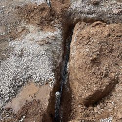 Los Gallos Landscaping - Carrying the gas line from the house to the fire pit!