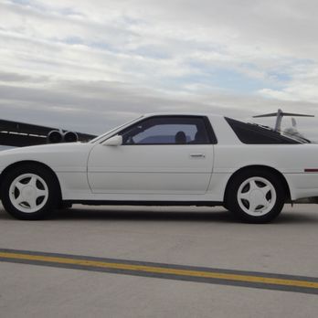 Chevron - a white car parked in front of an airplane - Gas Stations Near Me - Las Vegas, Nevada Chevron - a white car parked in front of an airplane - Gas Stations Near Me - Las Vegas, Nevada