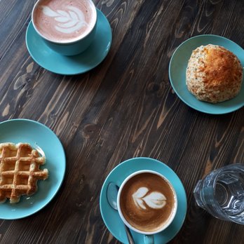 Prado Cafe + Kitchen - pink (beet?) latte, cheddar+chives scone, liege waffle, cappuccino - Coffee & Tea Near Me - Vancouver, British Columbia Prado Cafe + Kitchen - pink (beet?) latte, cheddar+chives scone, liege waffle, cappuccino - Coffee & Tea Near Me - Vancouver, British Columbia