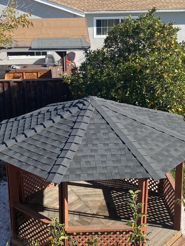 Slide of Tip Top Roofing