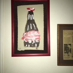Picture Perfect - Coca Cola bottle painted on drywall