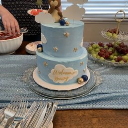 Custom two layer cake for baby shower guests