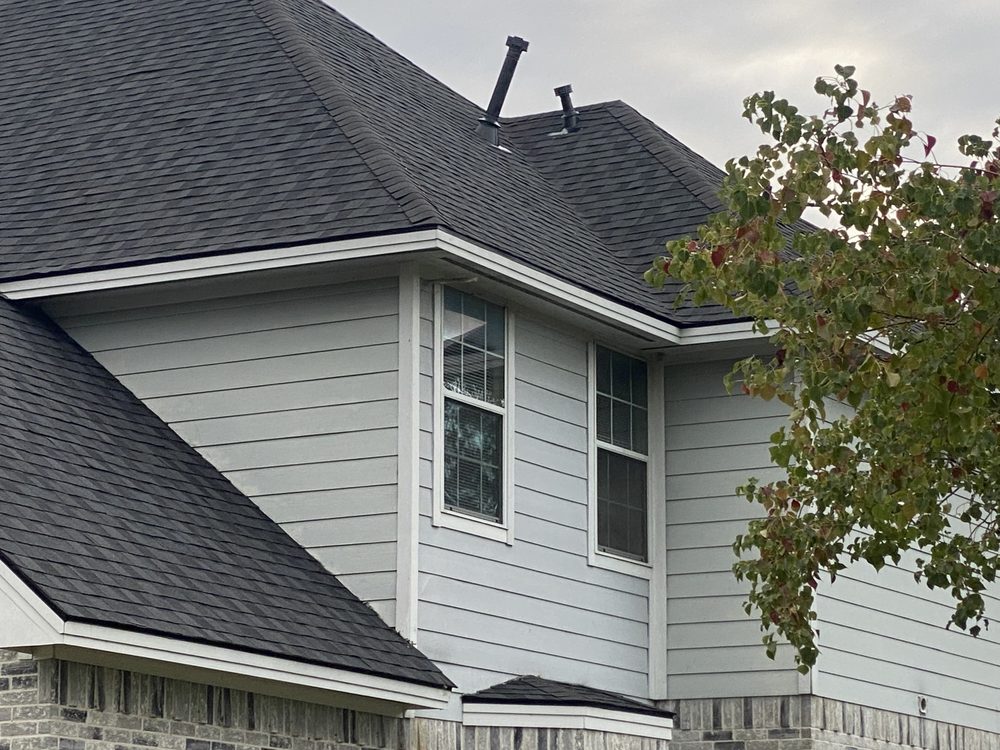 Slide of Big Randys Roofing