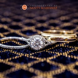 Photography by Santy Martinez - Wedding ring shot.