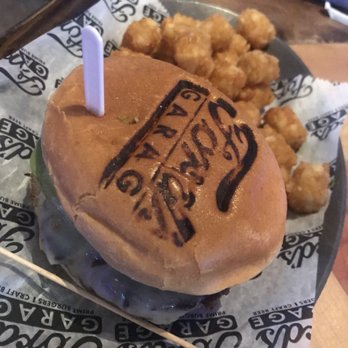 Ford's Garage St. Augustine - Cali Roadster 1/3 lb. burger with avocado and classic tots. Just right! - Burgers Near Me - St. Augustine, Florida Ford's Garage St. Augustine - Cali Roadster 1/3 lb. burger with avocado and classic tots. Just right! - Burgers Near Me - St. Augustine, Florida