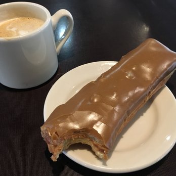 Top Pot Doughnuts - Glazed maple bar and cafe latte. - Bakeries Near Me - Seattle, Washington Top Pot Doughnuts - Glazed maple bar and cafe latte. - Bakeries Near Me - Seattle, Washington
