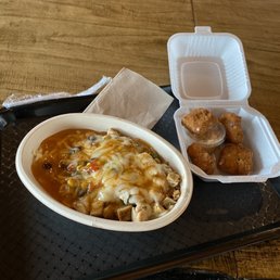 A chicken and rice bowl with Asian ginger sauce. A chicken and rice bowl with Asian ginger sauce.