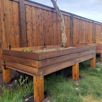 Jones Cleaning - Built the fence and raised garden beds and stained them. - Home Cleaning Near Me Jones Cleaning - Built the fence and raised garden beds and stained them. - Home Cleaning Near Me