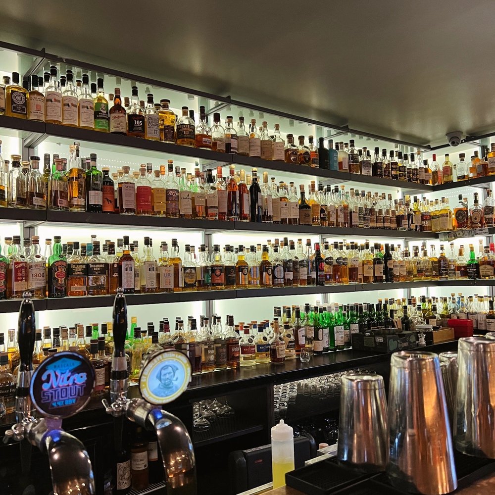 Bar Area! The photo only captures some of their whiskeys! Bar Area! The photo only captures some of their whiskeys!