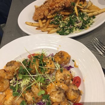 California Fish Grill - Louisiana Catfish with fries and kale slaw  Dynamite Shrimp Bowl - Fish & Chips Near Me - Daly City, California