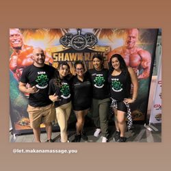 Aipa Massage - Noel & crew providing massages to bodybuilders at competition.