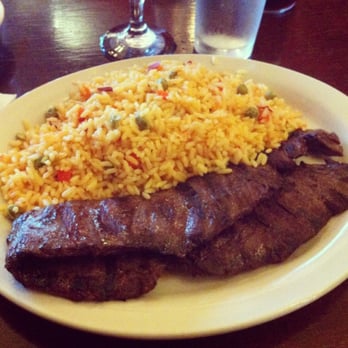El Nandu Restaurant - Entraña (skirt steak) and yellow rice - Latin American Near Me - Chicago, Illinois El Nandu Restaurant - Entraña (skirt steak) and yellow rice - Latin American Near Me - Chicago, Illinois