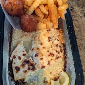 Dewey Destin's Harborside - Parmesan baked flounder (or red snapper) & hush puppies - Seafood Near Me - Destin, Florida Dewey Destin's Harborside - Parmesan baked flounder (or red snapper) & hush puppies - Seafood Near Me - Destin, Florida