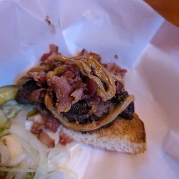 Beachcorner Bar & Grill - Just half of the peanut butter bacon burger with sweet jelly - Lounges Near Me - New Orleans, Louisiana